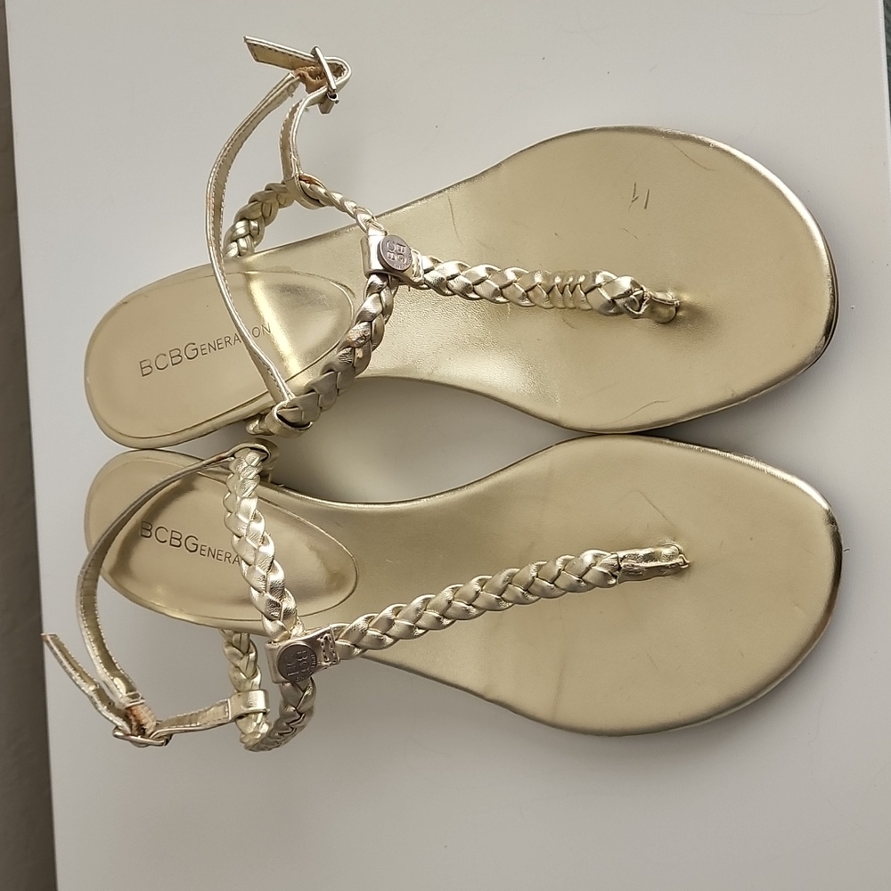 Gold BCBG sandals.